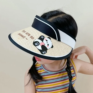 Detail of children straw sun hat featuring a cute panda print and Sweet text
