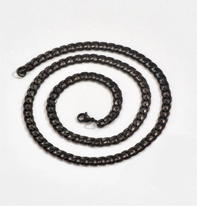 Close-up of black stainless steel Cuban chain necklace with secure lobster clasp