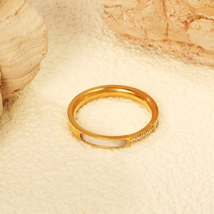 Minimalist 18K gold plated stainless steel bangle with white shell inlay and crystals