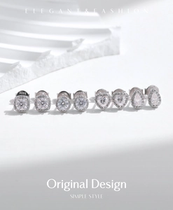 Macro detail of S925 sterling silver stud earrings in heart, square and drop shapes
