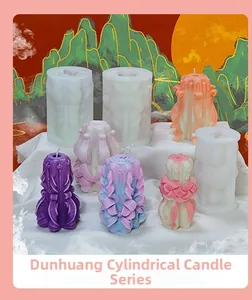 Macro view of Dunhuang style cylindrical silicone candle mold with 3D embossed texture