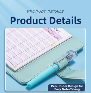 Close-up of A7 budget binder inner pages with expense tracker and elastic pen holder loop