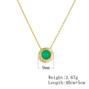 Detail view of gold S925 silver necklace with 9mm green agate pendant and specs