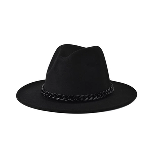 Close-up of black wide brim fedora hat featuring a stylish glossy chain band detail