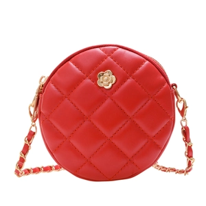 Quilted red round crossbody bag for girls with gold floral clasp and chain strap
