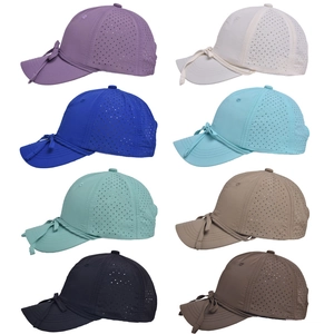 Detail view of quick-drying baseball caps in eight vibrant colors with bow tie design