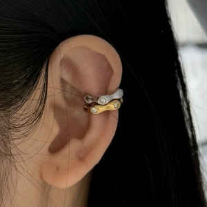 Irregular 316L stainless steel ear cuffs in gold and silver with zircon accents