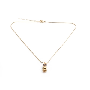 Detail of gold-plated fist pendant necklace with blue crystals and adjustable box chain
