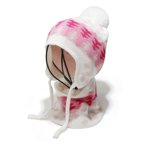 Detail of children knit hat and scarf set with soft fleece lining and fluffy white pompom