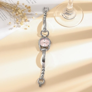 Vintage silver women's watch with pink dial, Roman numerals and horseshoe chain strap