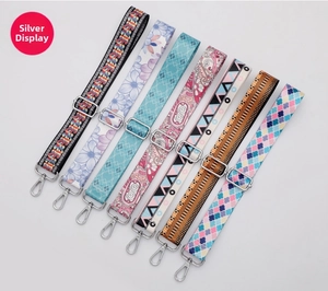 Variety of colorful 38mm wide replacement shoulder straps for bags with silver hardware.
