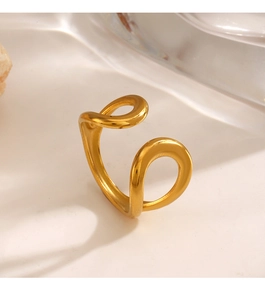Detailed top view of gold minimalist waterdrop ring on a natural stone base