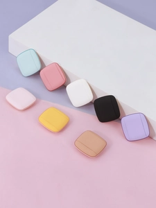 Detailed view of colorful square finger powder puffs with soft knitted mesh texture
