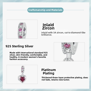 Detailed view of S925 sterling silver heart charm with red zircon and Forever Love engraving