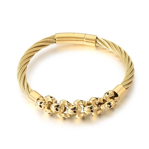 Gold skull twisted steel wire cuff bracelet for men featuring five skeletal charms
