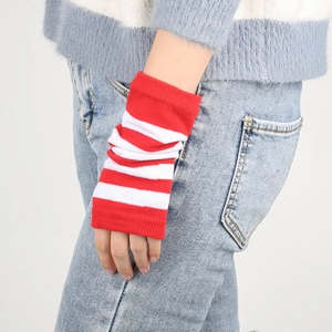 Close-up of red and white striped knit arm warmers shown on a model's wrist