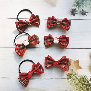 Christmas hair accessories set with red plaid bows and festive Santa Claus charms