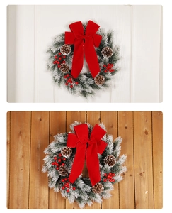 Detailed view of Christmas wreath with red bow, pine cones, and berries on wood