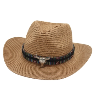 Classic Western straw cowboy hat with a bohemian band and metal bull skull ornament