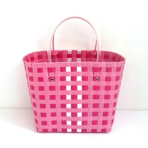 Pink woven plastic beach bag with checkered pattern and transparent handles