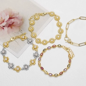 Collection of 18k gold plated bracelets with pearls, colorful zircons and daisy motifs