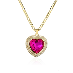 Luxe gold Figaro chain necklace with a ruby pink heart pendant and zircon pavé halo