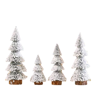 Set of four mini flocked Christmas trees with snow effect and natural wooden bases