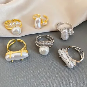 Irregular baroque pearl open rings in gold and silver finish with zircon accents