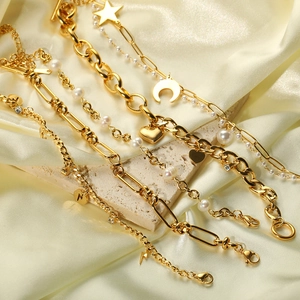 Elegant 18K gold-plated stainless steel bracelet collection with pearls and moon charms