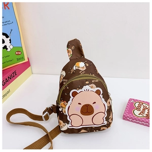 Detail of Capybara print kids chest bag showing cartoon patches and adjustable brown strap