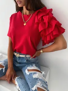 Close-up of elegant red t-shirt featuring multi-layered ruffle sleeve and round neck