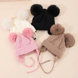 Classic diamond knit winter hat for children with ear flaps and double faux fur pom-poms