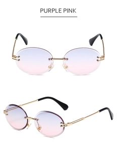 Detail view of purple pink gradient rimless oval lenses and golden metal temples