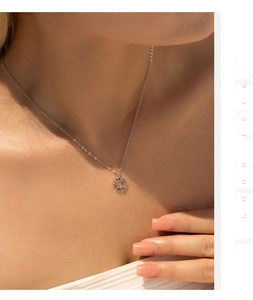Close-up of S925 sterling silver necklace with colorful round gemstone pendant on neck