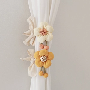 Floral curtain tiebacks for kids rooms featuring beige and yellow flower designs