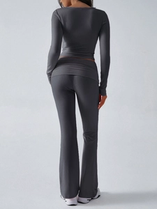 Rear view of slim fit knit sports set featuring long sleeve top and flared leggings