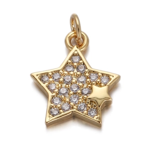 Detail of gold star pendant with embedded clear crystals and glossy layered star design