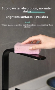 Pink high-density sponge cleaning a matte black faucet with strong water absorption