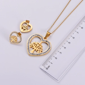Detailed view of Tree of Life jewelry set dimensions with ruler for scale reference