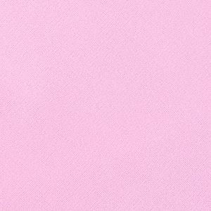 Close-up of pink dress fabric showing detailed woven texture and high-quality material