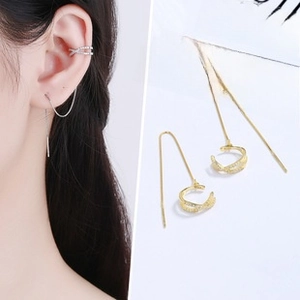 Detail of 925 sterling silver gold flower tassel ear cuffs with sparkling cz crystals