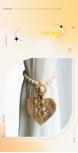 Detail of bohemian leaf curtain tieback with woven cotton rope and light wood beads