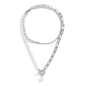 Detail of silver chain layers with white baroque pearl pendant and OT clasp