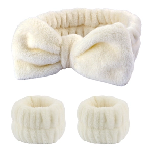 Creamy white plush headband with bow and matching absorbent wristbands set for face washing