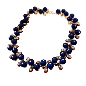 Vintage resin teardrop necklace with deep blue beads, gold leaves and crystal accents