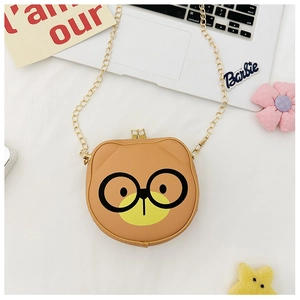 Close-up of a brown cartoon bear crossbody bag with a gold chain strap and dual zippers