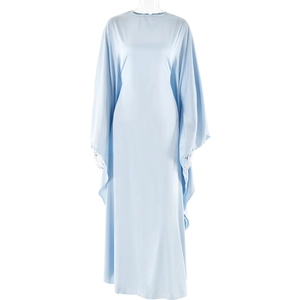 Detail of light blue satin kaftan dress showing elegant loose batwing sleeves and flowy fabric