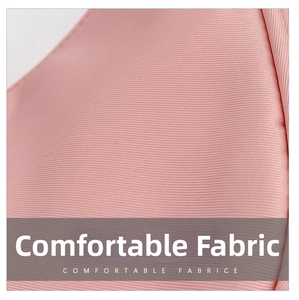 Macro texture of pink nylon fabric with fine cross-weave detail on the crossbody bag