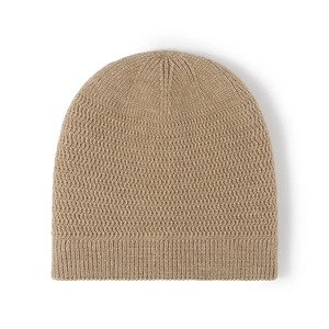 Thick winter fleece lined knitted beanie in camel color with ribbed texture for outdoor warmth