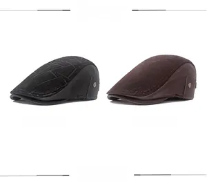 Detail of leather ivy cap with textured geometric patterns and metal side buckles